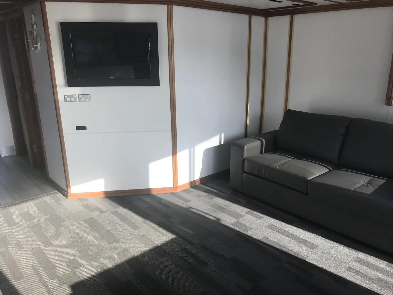 lounge area to rear with TV